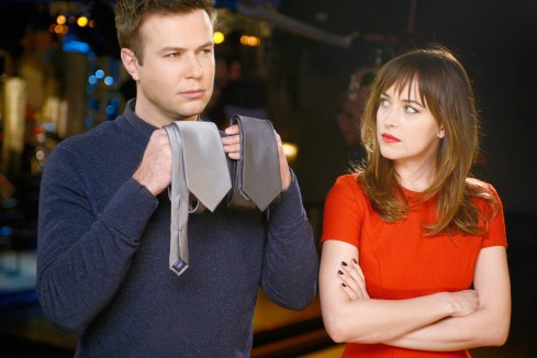 54ee3c018a2fdf646460363a_t-dakota-johnson-snl-cop-02